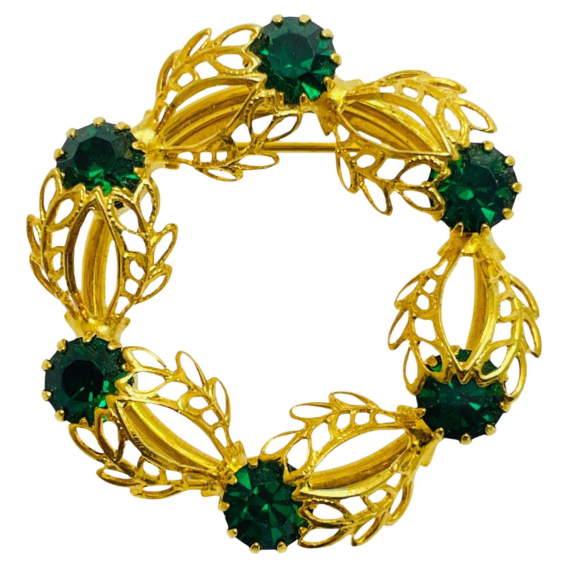 Spilla vintage con strass verde smeraldo in tonalità oro