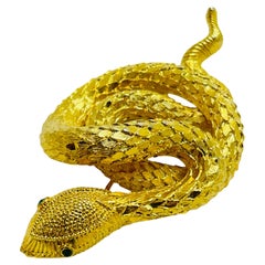 Vintage gold tone emerald green rhinestones snake designer brooch