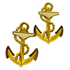 Boucles d'oreilles vintage en émail doré avec ancre nautique.