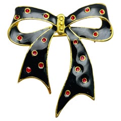 Vintage gold tone enamel bow designer brooch