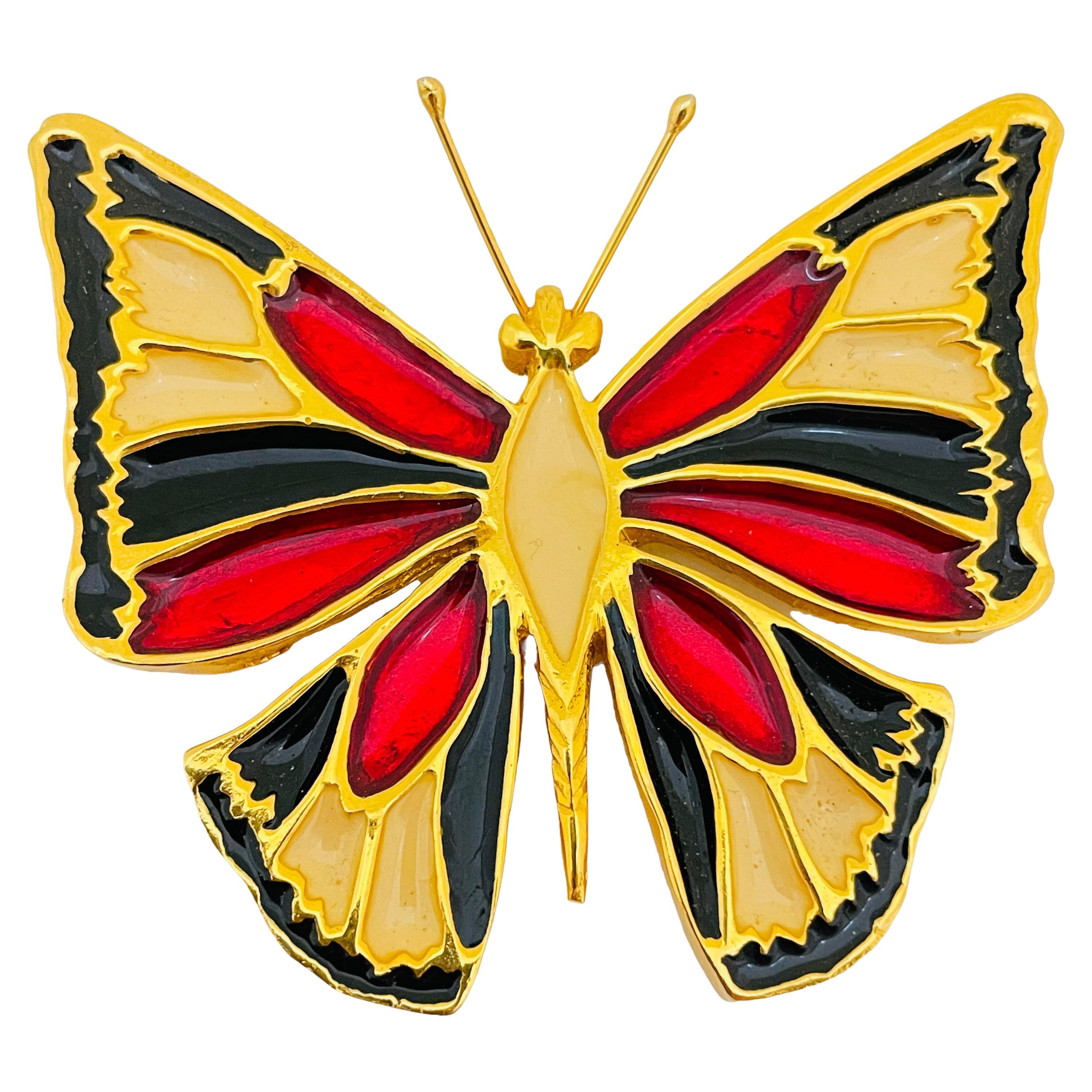 Spilla di design con farfalla in smalto dorato vintage
