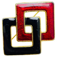 Broche vintage de diseño esmaltado en tono dorado