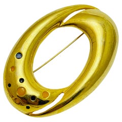 Vintage gold tone enamel designer brooch