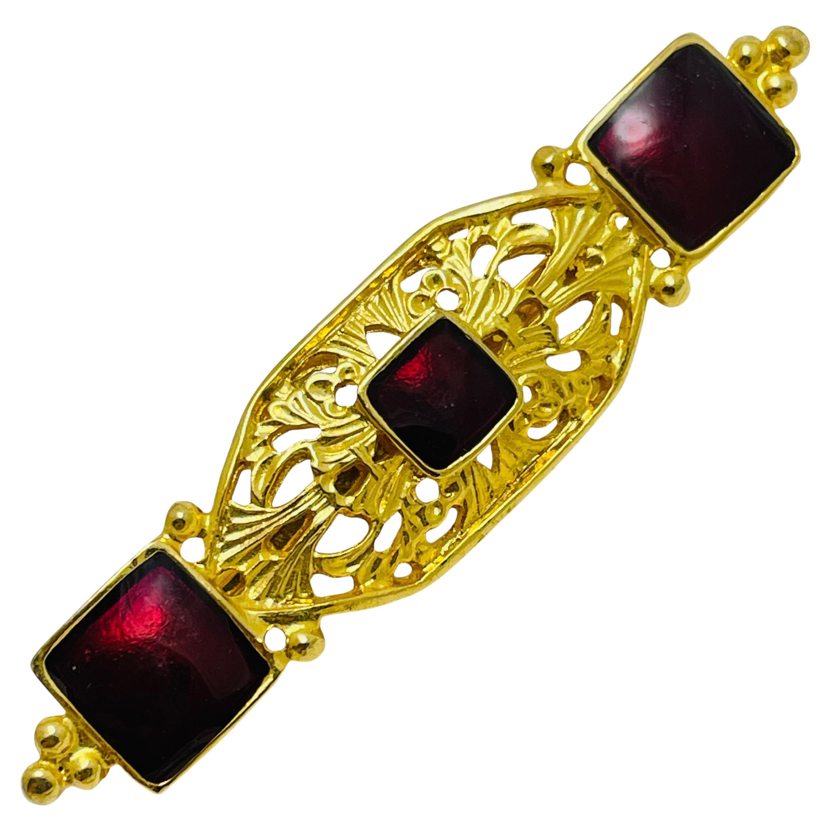 Vintage gold tone enamel designer brooch For Sale