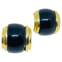 Vintage gold tone enamel designer clip on earrings