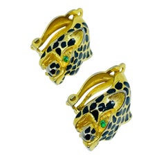 Vintage gold tone enamel emerald eyes panther clip on earrings