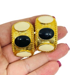Vintage gold tone enamel Etruscan designer clip on earrings