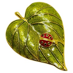 Vintage gold tone enamel leaf ladybug designer brooch