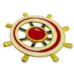Vintage gold tone enamel nautical designer brooch