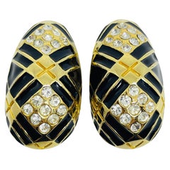 Boucles d'oreilles clips vintage en émail doré et strass.