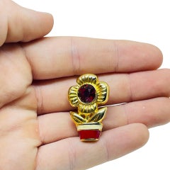 Vintage gold tone enamel rhinestone designer flower brooch