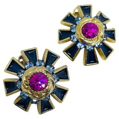 Vintage gold tone enamel rhinestone flower designer clip on earrings
