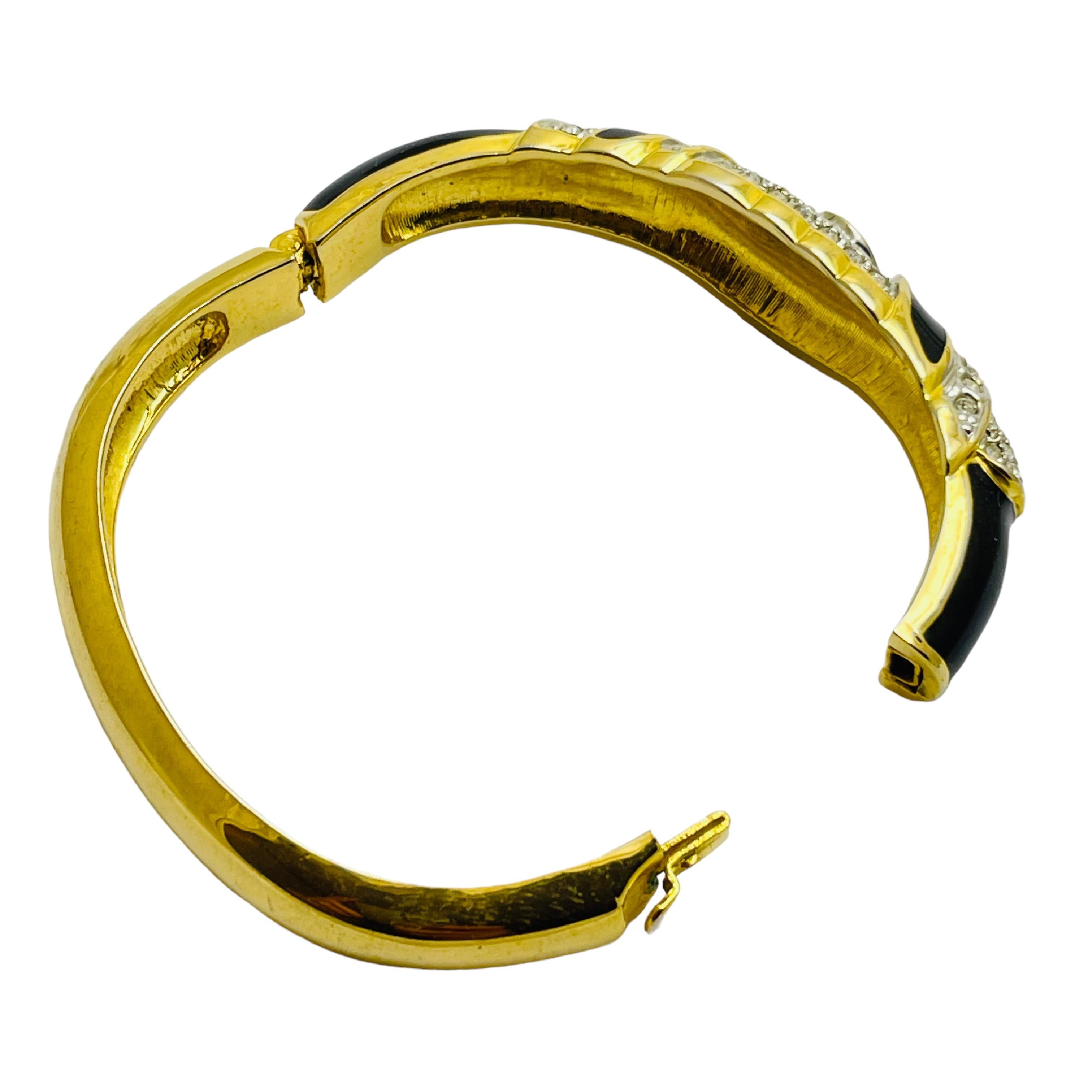 Women's Vintage gold tone enamel rhinestones designer bracelet For Sale