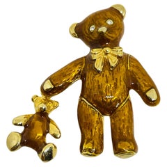 Spilla vintage con orsacchiotto di design in smalto dorato e strass