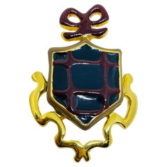 Vintage gold tone enamel shield bow designer brooch