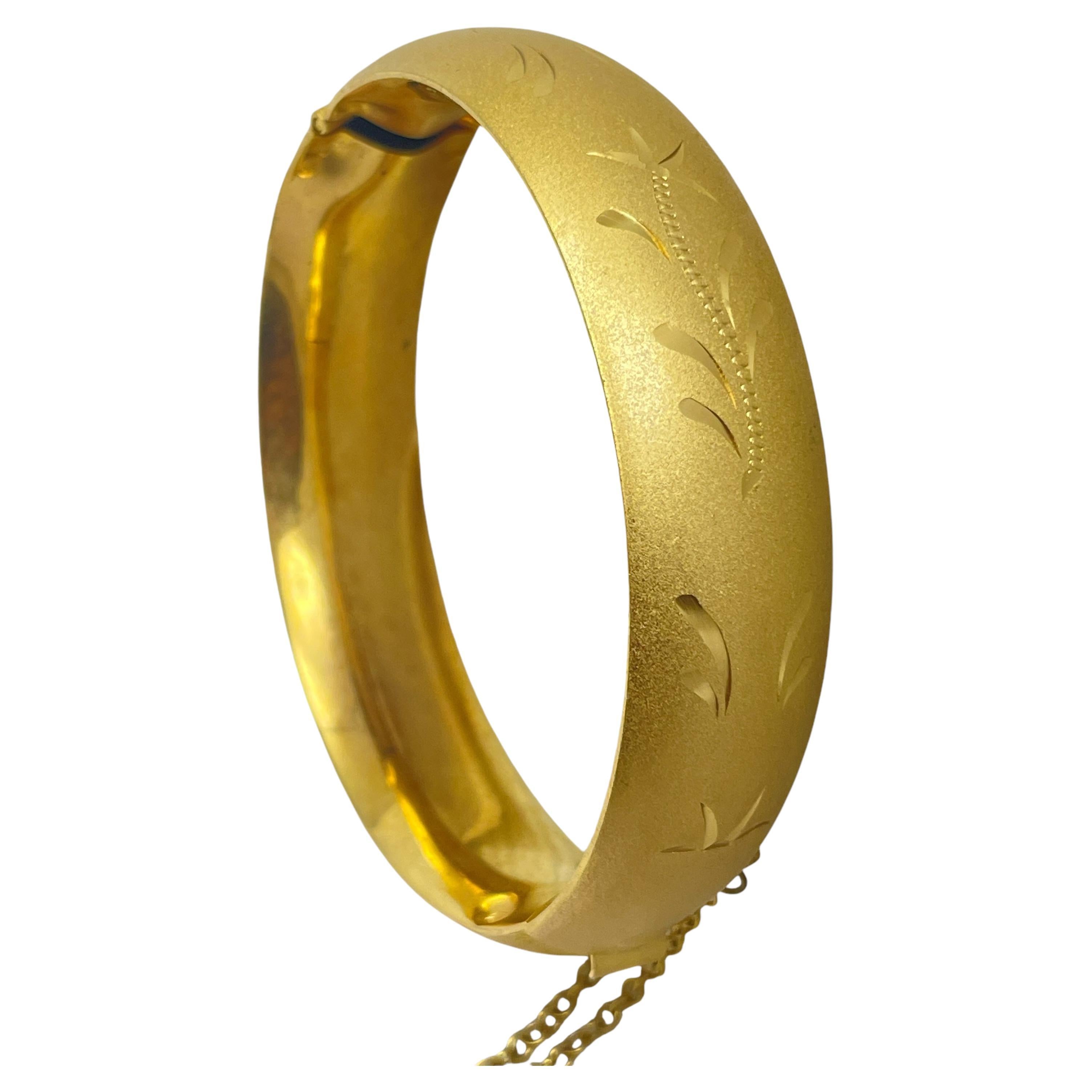 Vintage gold tone engraved designer bracelet For Sale