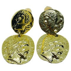 Vintage gold tone Etruscan coin dangle designer clip on earrings Vintage gold tone Etruscan coin dangle designer clip on earrings