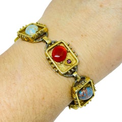 Bracciale vintage con gemme di vetro in stile etrusco in tonalità oro