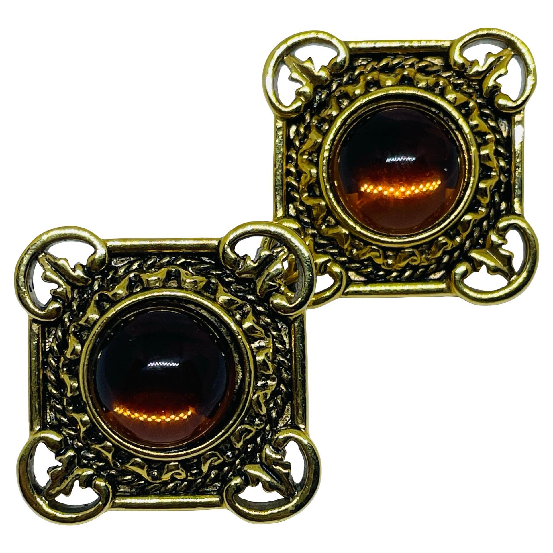 Vintage gold tone faux amber designer pierced earrings For Sale