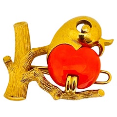 Vintage gold tone faux coral bird brooch clip