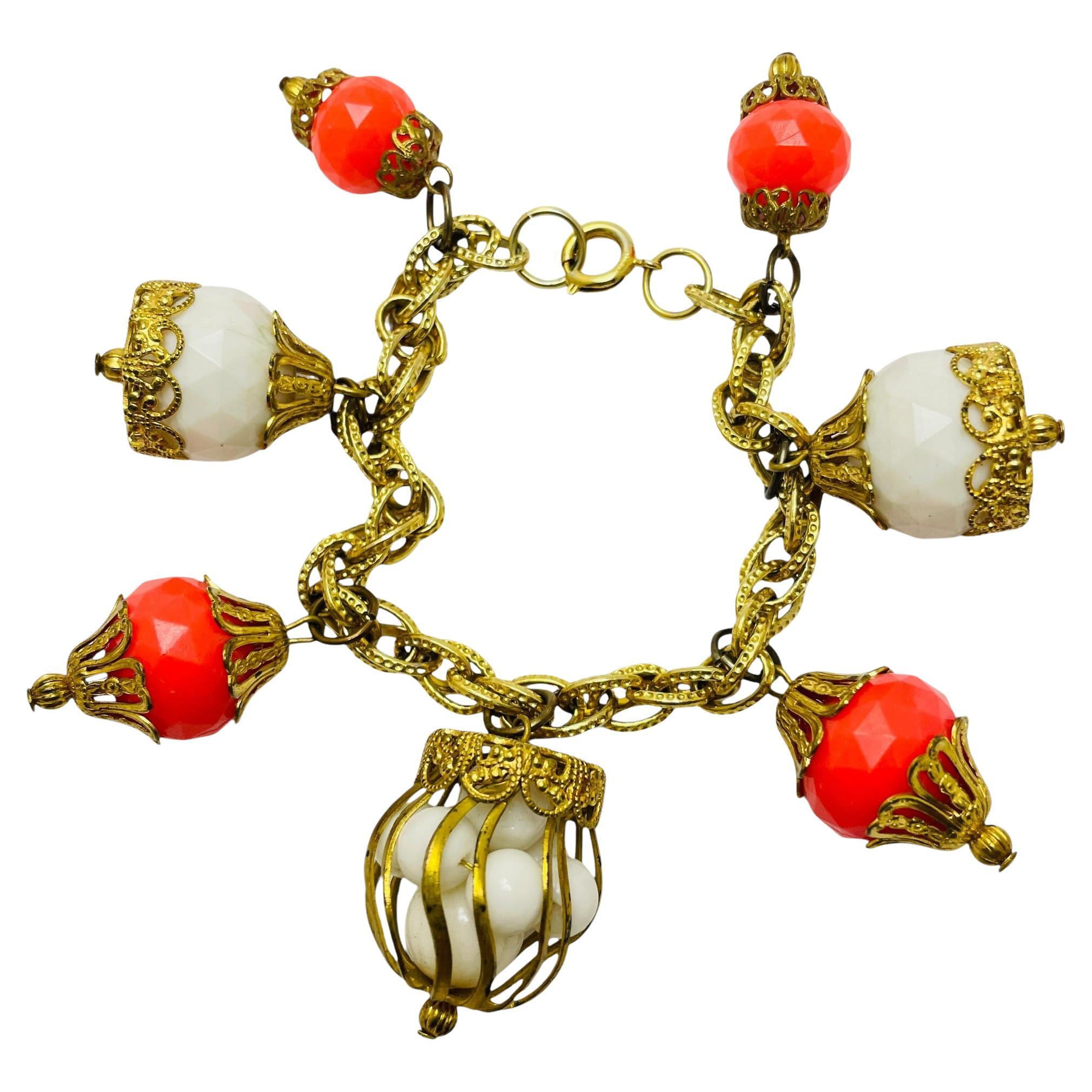 Vintage gold tone faux coral white beads charm designer bracelet