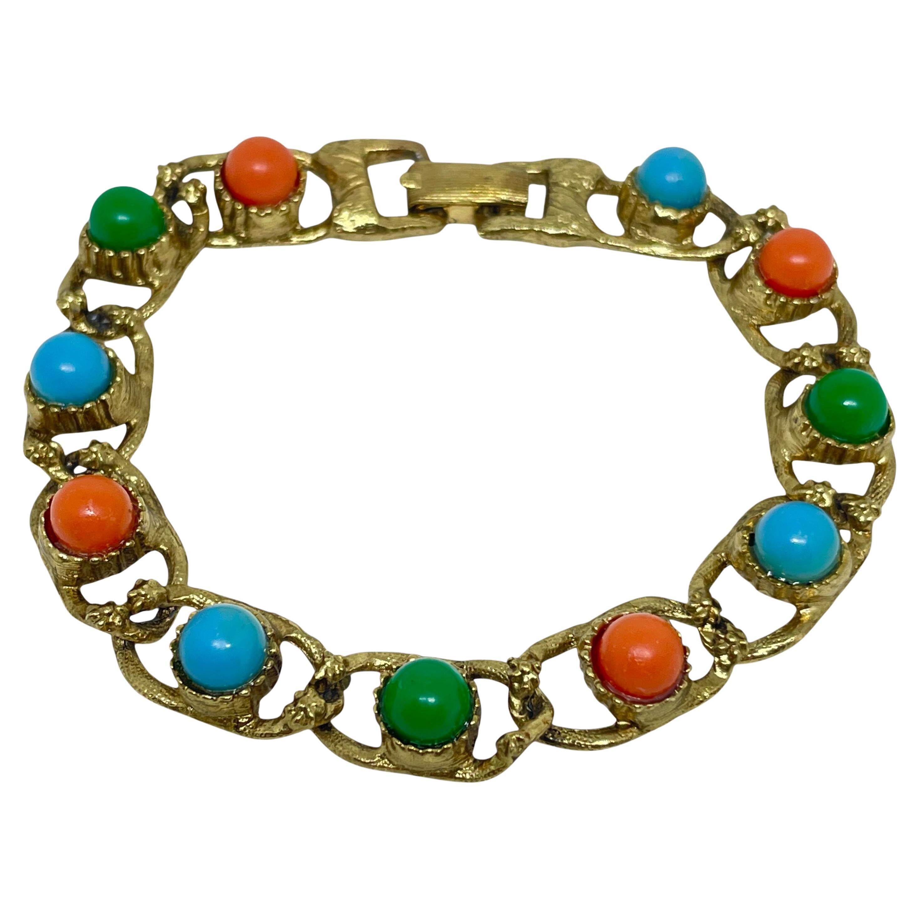 Bracciale d
oro d
epoca in finta giada, corallo e turchese
