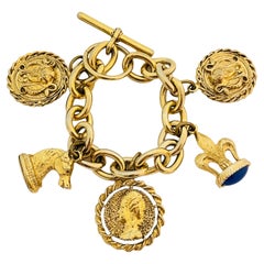 Vintage gold tone faux lapis charm chain bracelet with toggle clasp