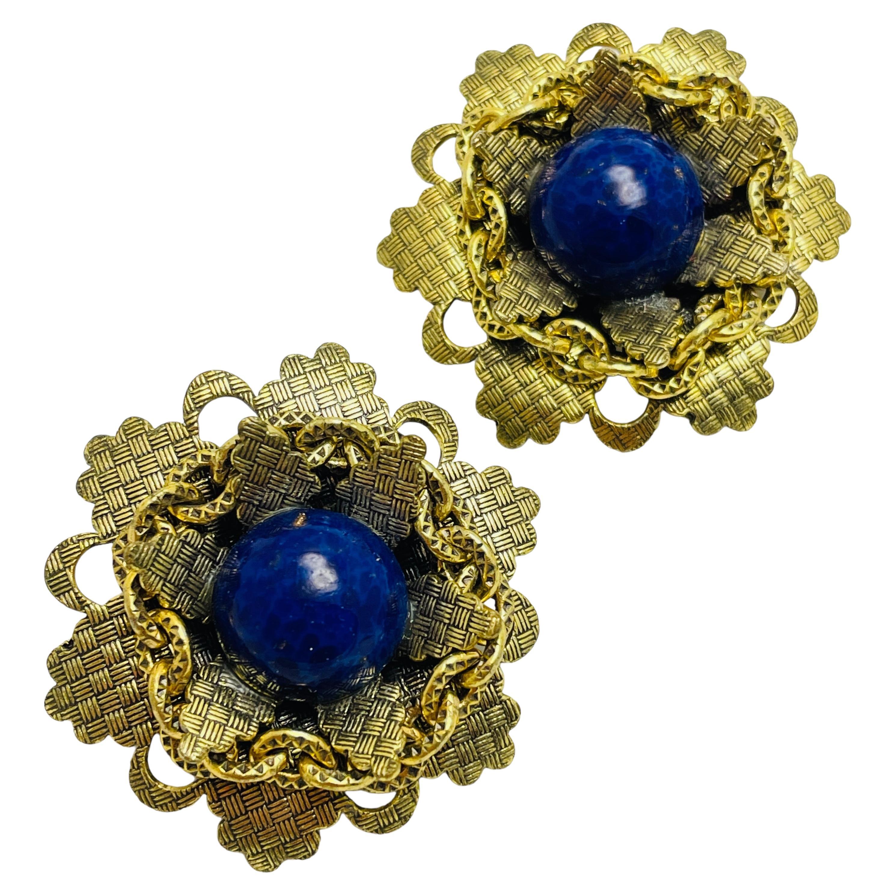 Vintage gold tone faux lapis flower designer clip on earrings For Sale