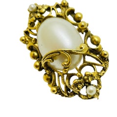Vintage gold tone faux pearl designer brooch