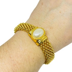 Vintage gold tone faux pearl designer chain bracelet