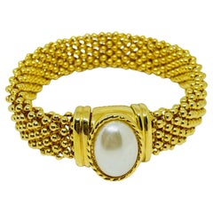 Vintage gold tone faux pearl designer chain bracelet
