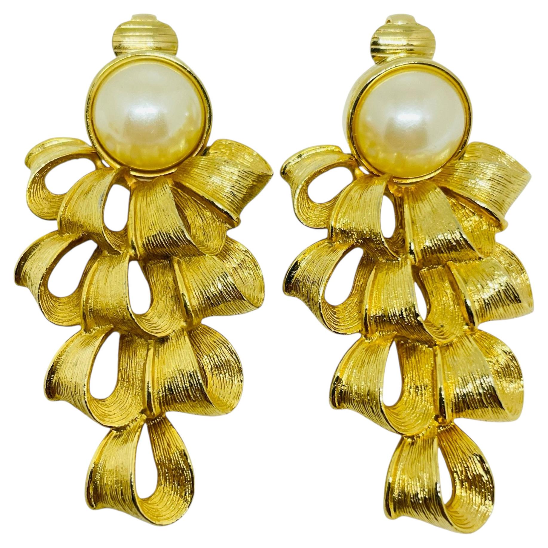 Vintage gold tone faux pearl designer clip earrings
