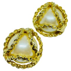 Vintage gold tone faux pearl designer clip on earrings