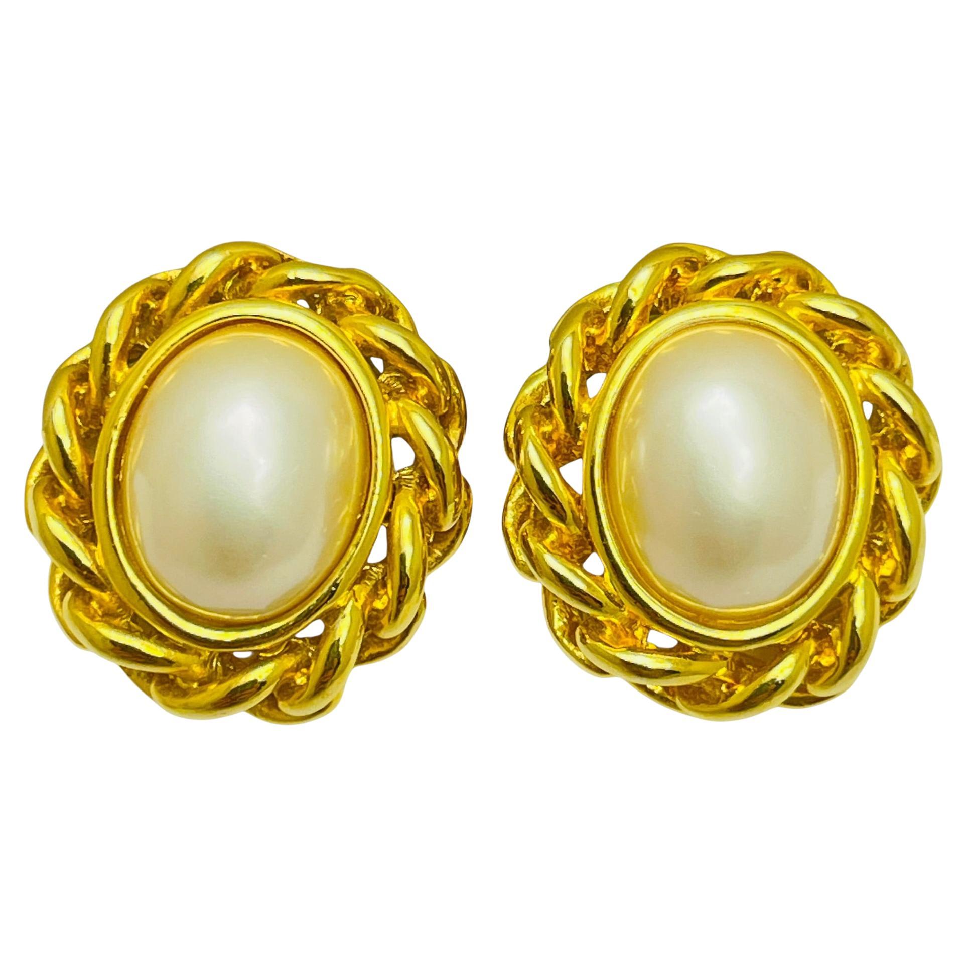 Vintage gold tone faux pearl designer earrings