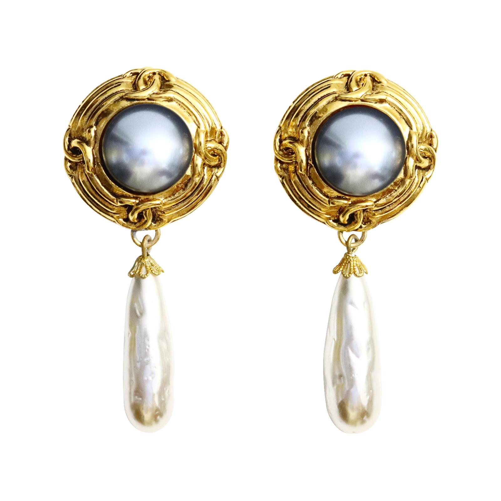 Vintage French Gold Tone  Faux Pearl Grey and Ivory Dangling Earrings. Very much in the style of Chanel. Just have a good look at these.  The color gold is in the style of Chanel.  These French-made earrings feature the Chanel design in gold and a