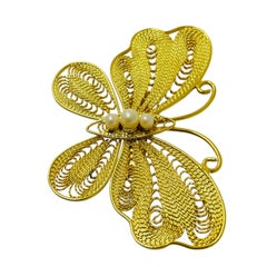 Broche vintage de diseño con mariposa de perlas de imitación en tono dorado
