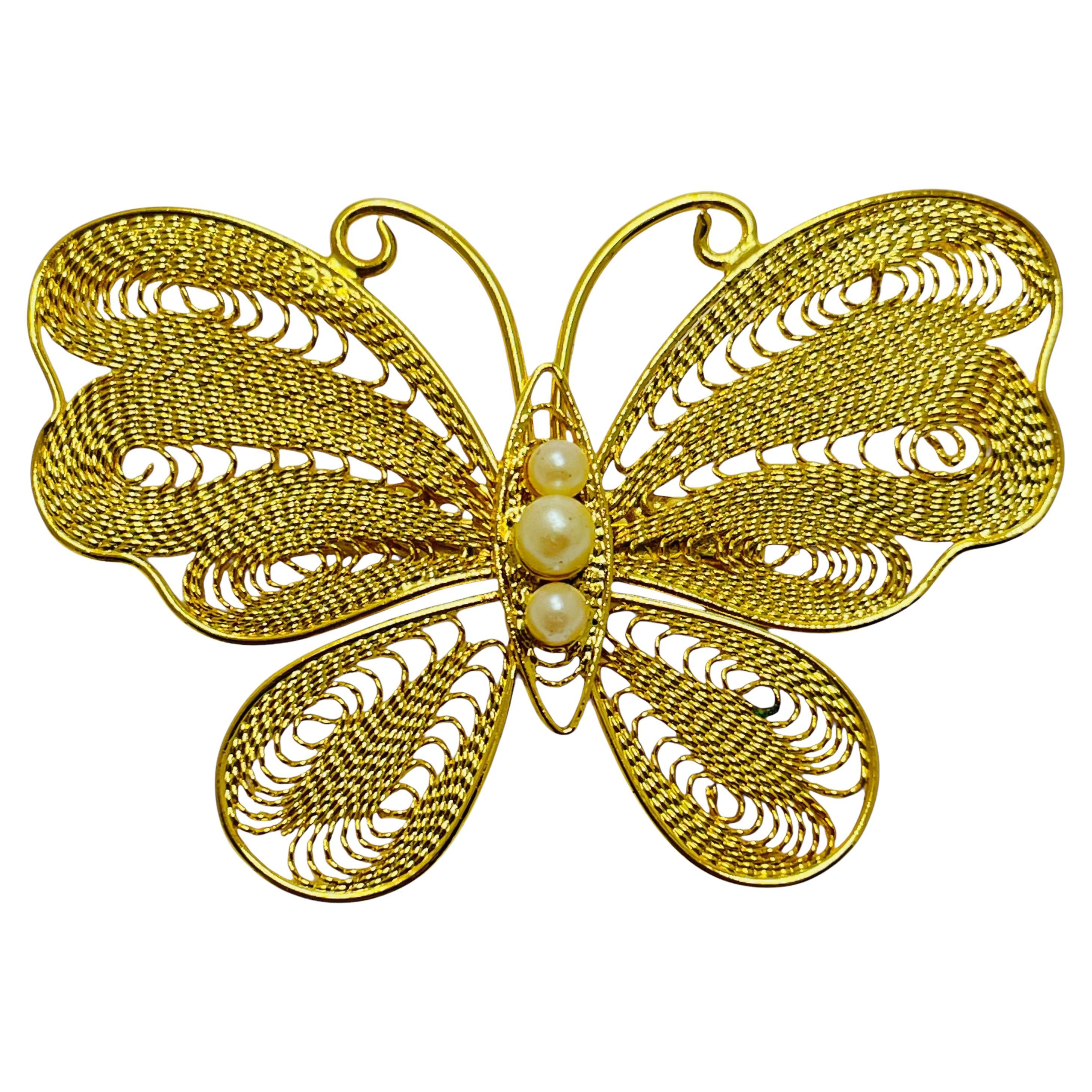 Vintage gold tone faux pearls butterfly designer brooch