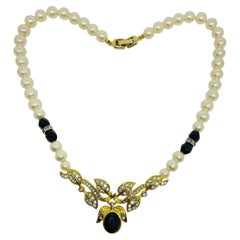 Vintage gold tone faux pearls crystals designer necklace