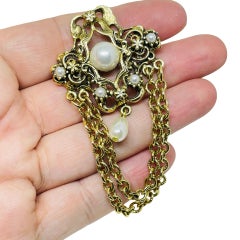 Vintage gold tone faux pearls dangle chains designer brooch