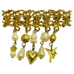 Vintage gold tone faux pearls dangle charms designer brooch