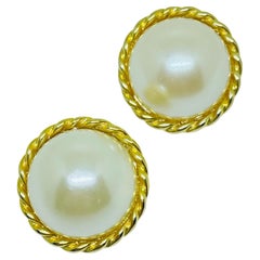 Vintage gold tone faux pearls designer clip on earrings