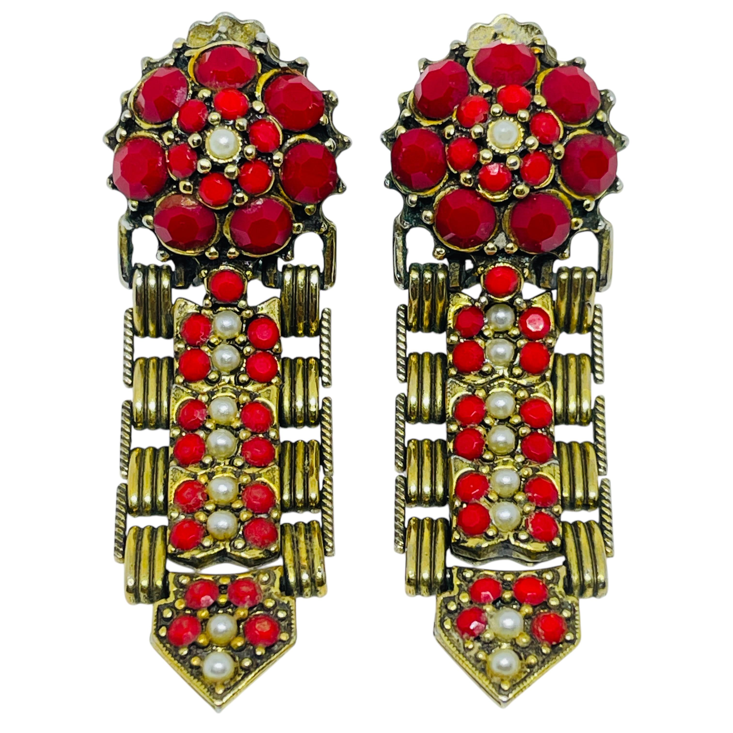 Orecchini a clip d
epoca con perle finte e strass rossi di design