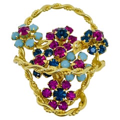 Vintage gold tone faux sapphire ruby turquoise flower basket designer brooch