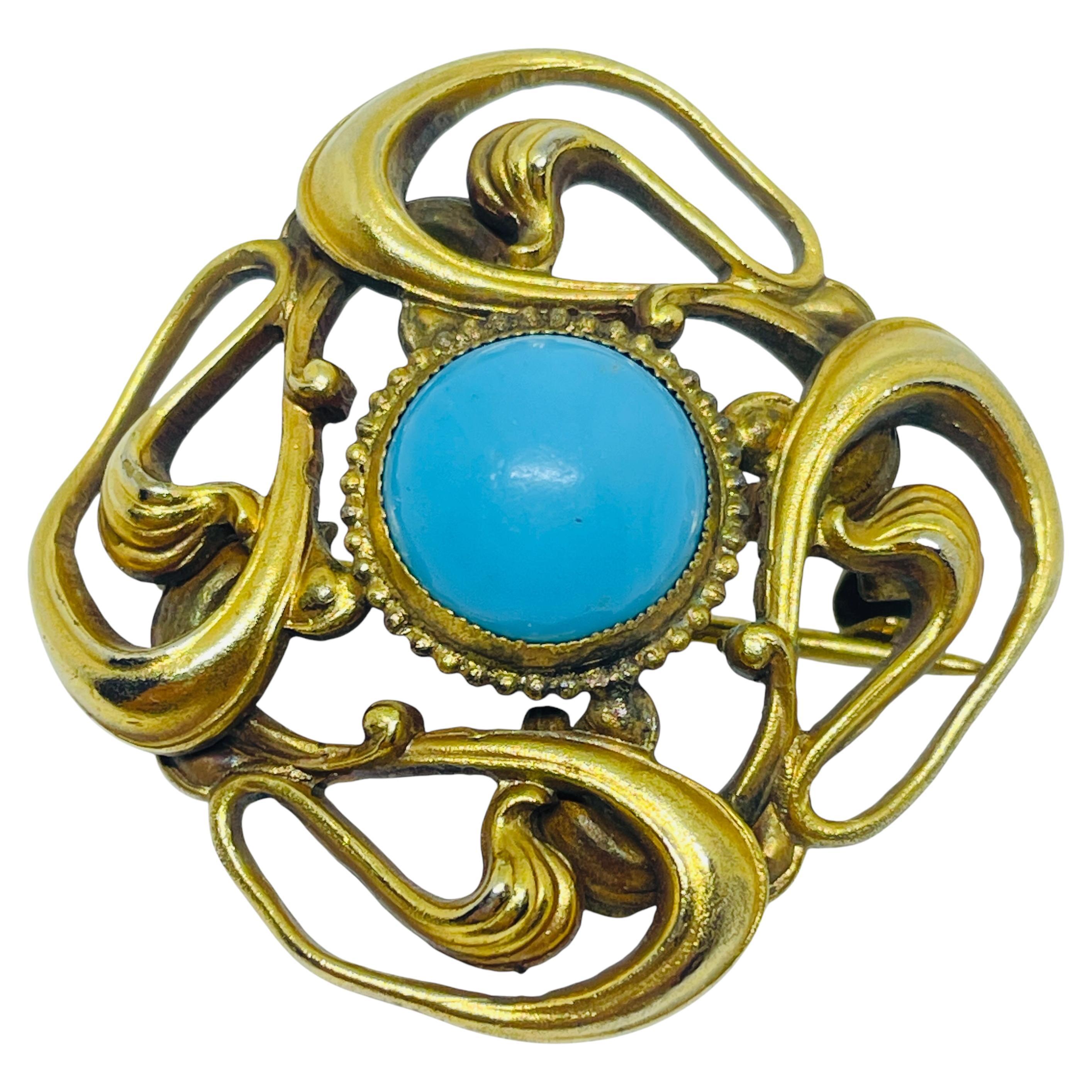 Vintage gold tone faux turquoise designer brooch For Sale