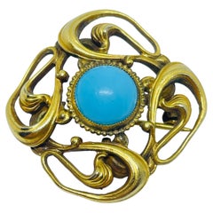 Spilla d
epoca in oro con finto turchese di design