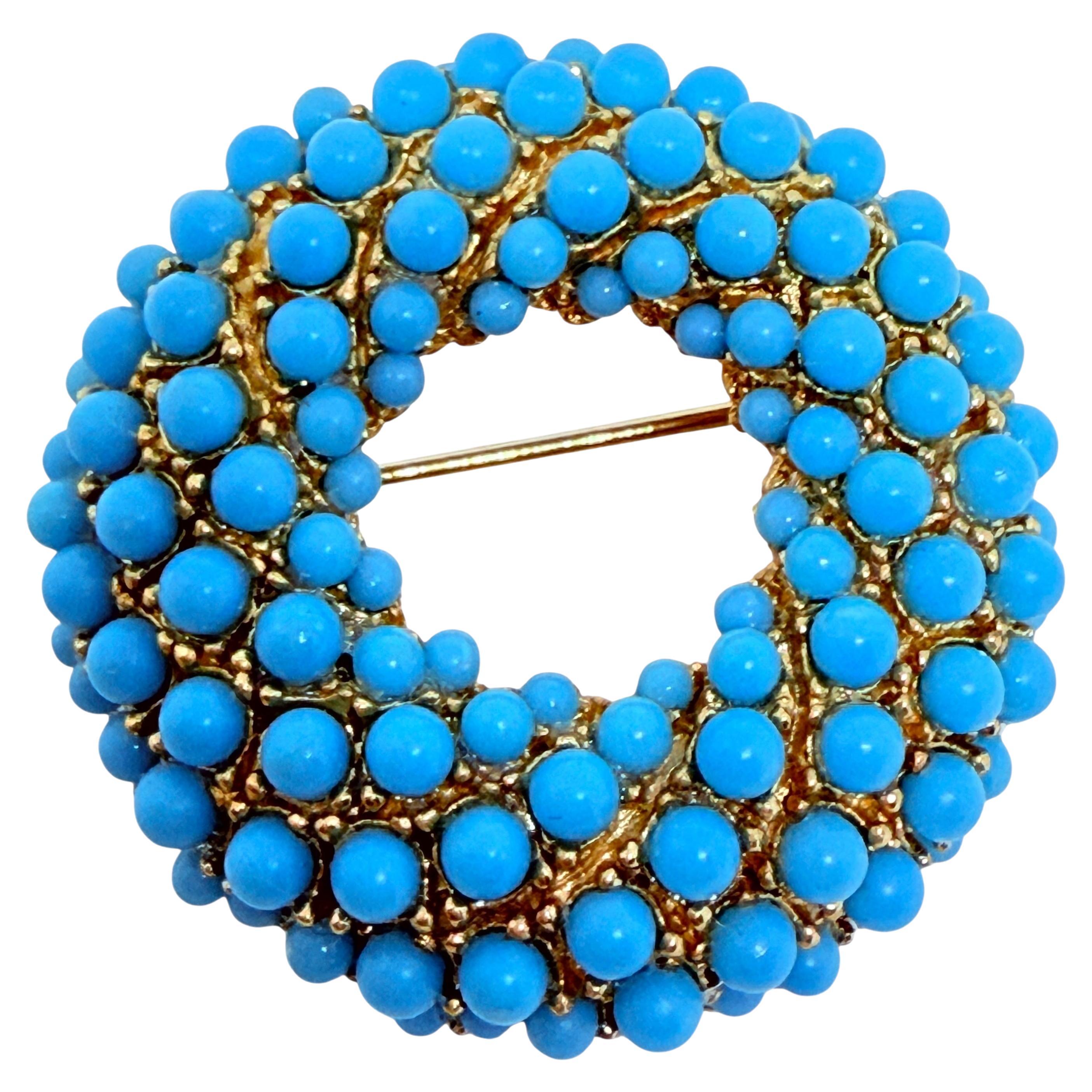 Vintage gold tone faux turquoise designer brooch