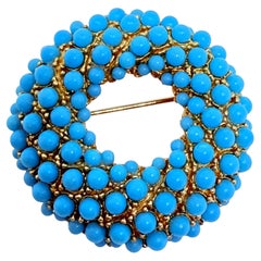 Vintage gold tone faux turquoise designer brooch