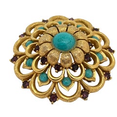 Vintage gold tone faux turquoise rhinestone brooch