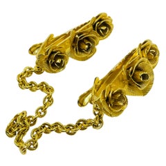 Vintage gold tone flower sweater clips