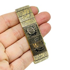 Bracciale a maglie di design vintage con fiori incisi in tonalità oro